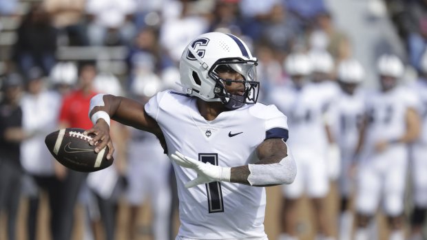 When the UConn defense lines up against the Buffalo offense they'll see a familiar face in QB Ta'Quan Roberson. The former Husky transferred and is the Bulls' QB1. (AP Photo/Michael Wyke)