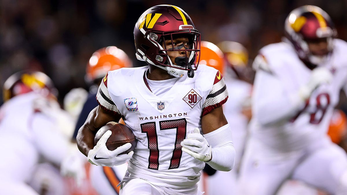Terry McLaurin runs with the football