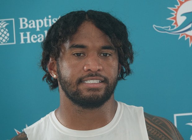 Miami Dolphins quarterback Tua Tagovailoa speaks to the media during...