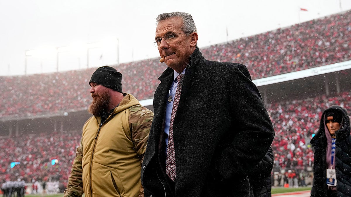 Urban Meyer looks on