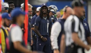 CeeDee Lamb takes big hit from sprinting official while on the sideline