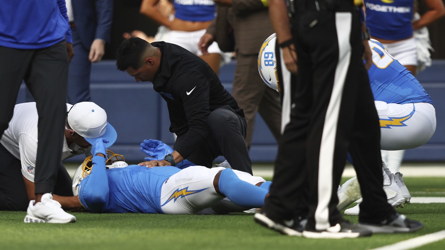 Chargers WR Quentin Johnston leaves field on cart after big hit on 3rd snap vs Rams