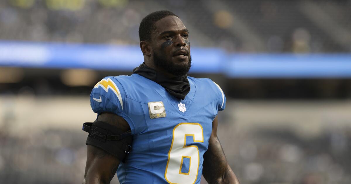 Jim Harbaugh says he visited with Chargers' Denzel Perryman in jail