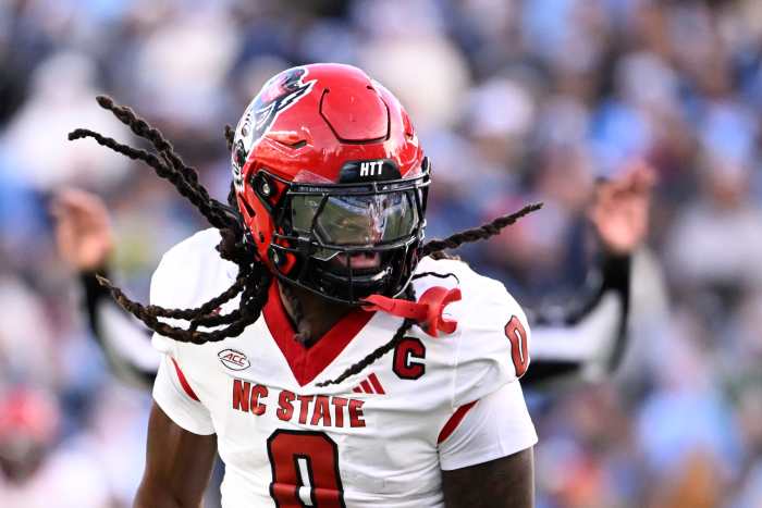 Nov 30, 2024; Chapel Hill, North Carolina, USA; North Carolina State Wolfpack linebacker Sean Brown (0) reacts after recovering a fumble in the first quarter at Kenan Memorial Stadium. Mandatory Credit: Bob Donnan-Imagn Images