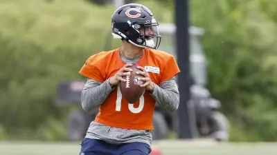 un 3, 2025; Lake Forest, IL, USA; Chicago Bears quarterback Caleb Williams (18) looks to pass the ball during minicamp at Halas Hall.