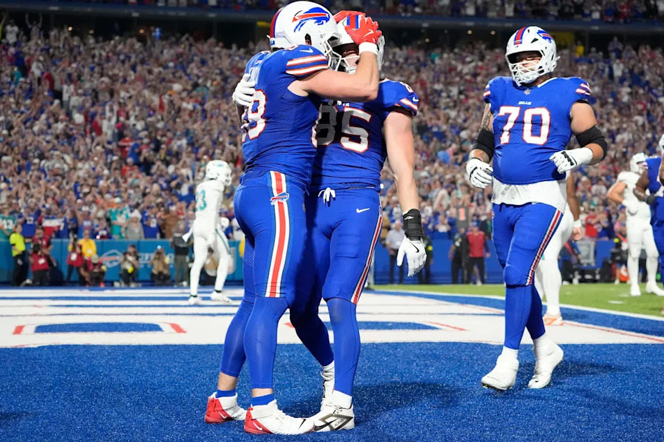 Sep 18, 2025; Orchard Park, New York, USA; Buffalo Bills tight end Jackson Hawes (85) celebrates with tight end Dawson Knox (88) after scoring a touchdown against the Miami Dolphins in the second quarter at Highmark Stadium. Mandatory Credit: Gregory Fisher-Imagn Images