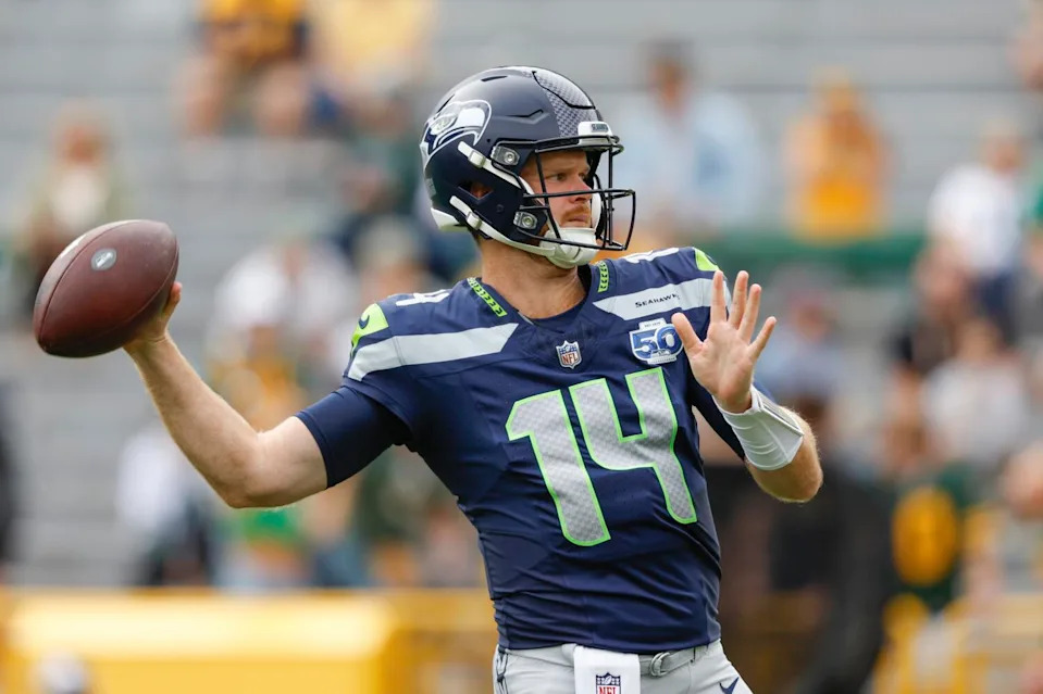 Seattle Seahawks quarterback Sam Darnold warms up before a preseason game against the Green Bay Packers on Aug. 23.
