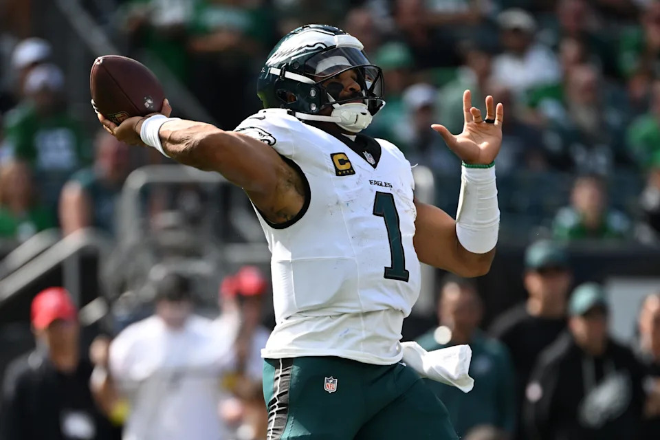 Sep 21, 2025; Philadelphia, Pennsylvania, USA;Philadelphia Eagles quarterback Jalen Hurts (1) drops back to pass against the Los Angeles Rams during the second half at Lincoln Financial Field. Mandatory Credit: Eric Hartline-Imagn Images