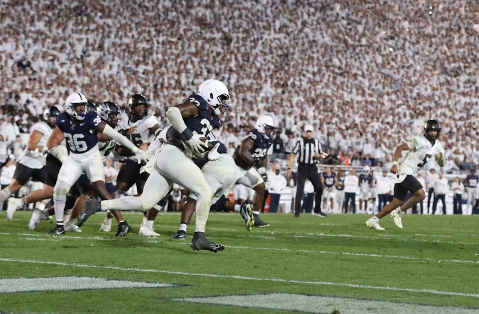 Sep 27, 2025; University Park, Pennsylvania, USA; Penn State Nittany Lions defensive tackle Owen Wafle (34) intercepts a two point conversion attempt during overtime against the Oregon Ducks at Beaver Stadium.