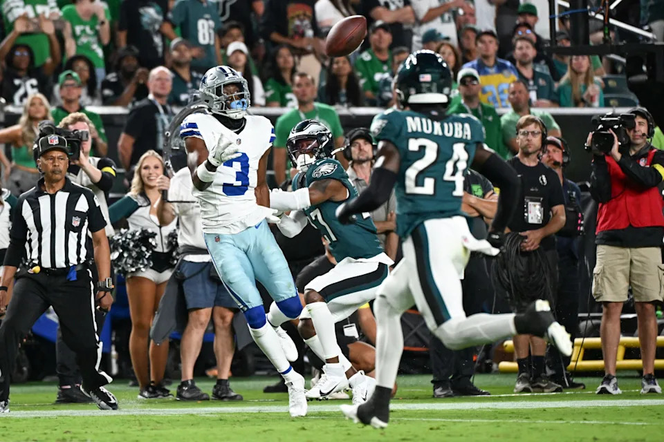 Sep 4, 2025; Philadelphia, Pennsylvania, USA; Dallas Cowboys wide receiver George Pickens (3) makes a reception defended by Philadelphia Eagles cornerback Quinyon Mitchell (27) during the first quarter of the game at Lincoln Financial Field. Mandatory Credit: Eric Hartline-Imagn Images