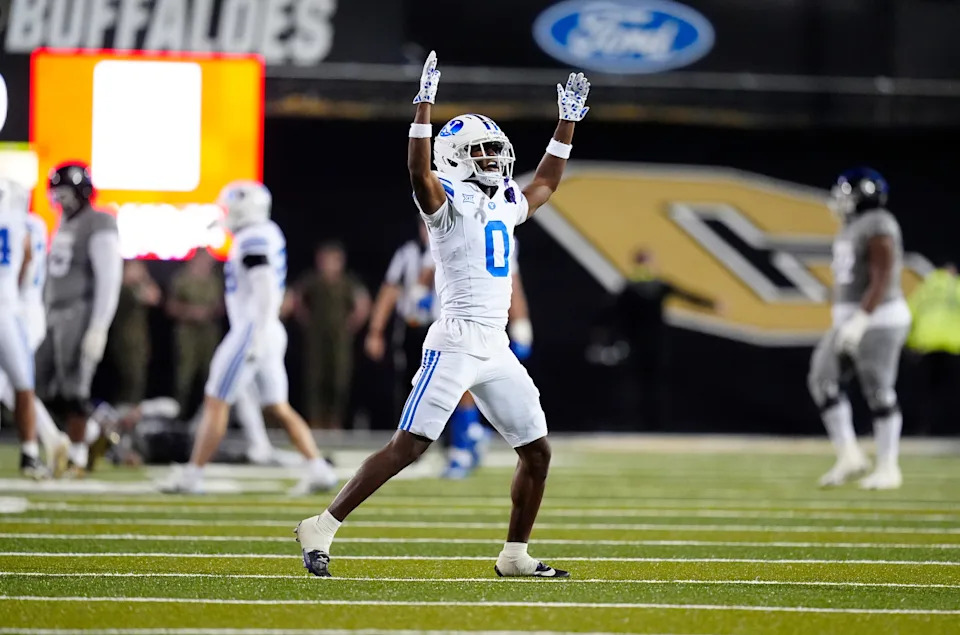 Sep 27, 2025; Boulder, Colorado, USA; Brigham Young Cougars cornerback Evan Johnson (0) celebrates a turnover in the fourth quarter against the Colorado Buffaloes at Folsom Field.