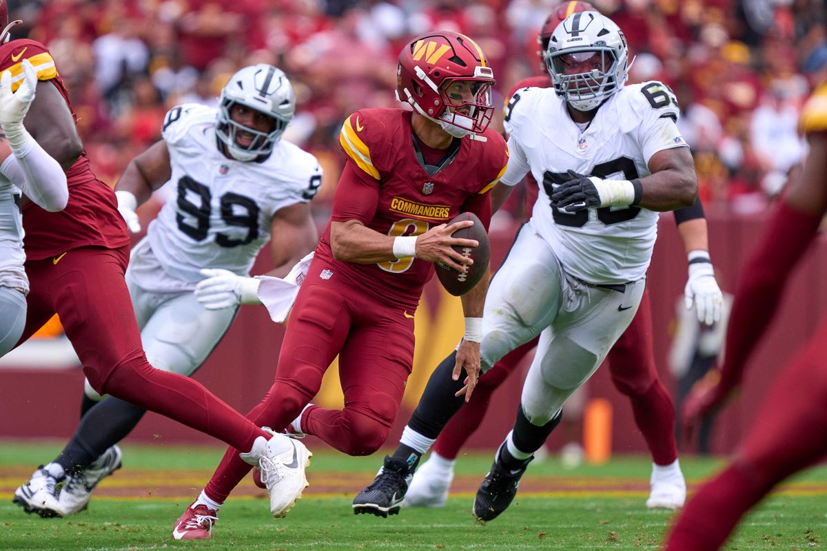 Marcus Mariota #8 of the Washington Commanders runs with the football during the first half against the Las Vegas Raiders during an NFL football game at Northwest Stadium on September 21, 2025 in Landover, Maryland. Marcus Mariota #8 of the Washington Commanders runs with the football during the first half against the Las Vegas Raiders during an NFL football game at Northwest Stadium on September 21, 2025 in Landover, Maryland.