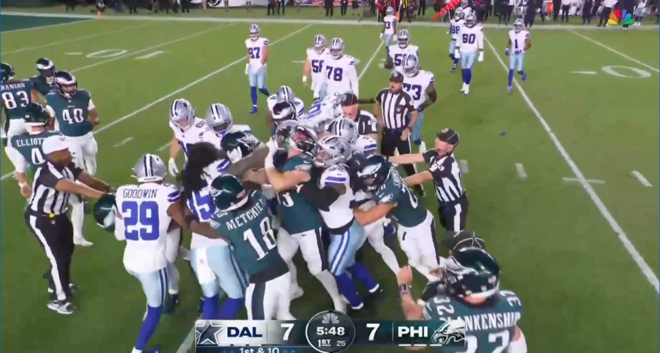 Screenshot of a football game showing a pile-up of players.