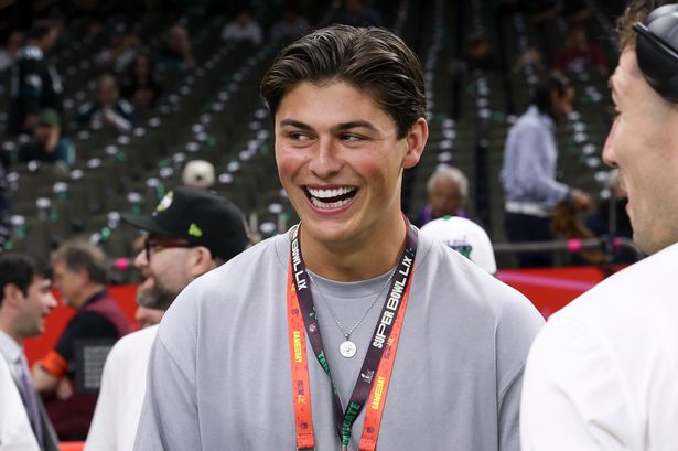 Louis Rees-Zammit reacts on the sideline prior to Super Bowl LIX