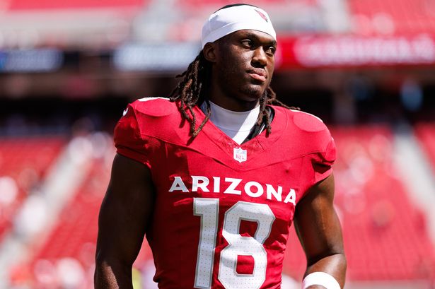 Marvin Harrison Jr. #18 of the Arizona Cardinals stretches on the field prior to an NFL football game against the San Francisco 49ers at Levi's Stadium on September 21, 2025 in Santa Clara, California