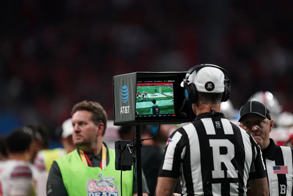 College Football: Peach Bowl: Referee performs a booth review during Georgia vs Ohio State game at Mercedes-Benz Stadium. (Photo by Carlos M. Saavedra/Sports Illustrated via Getty Images)Carlos M. Saavedra/Getty Images