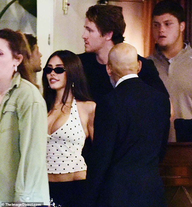 The new couple were pictured together at the celebrity hot-spot restaurant Delilah