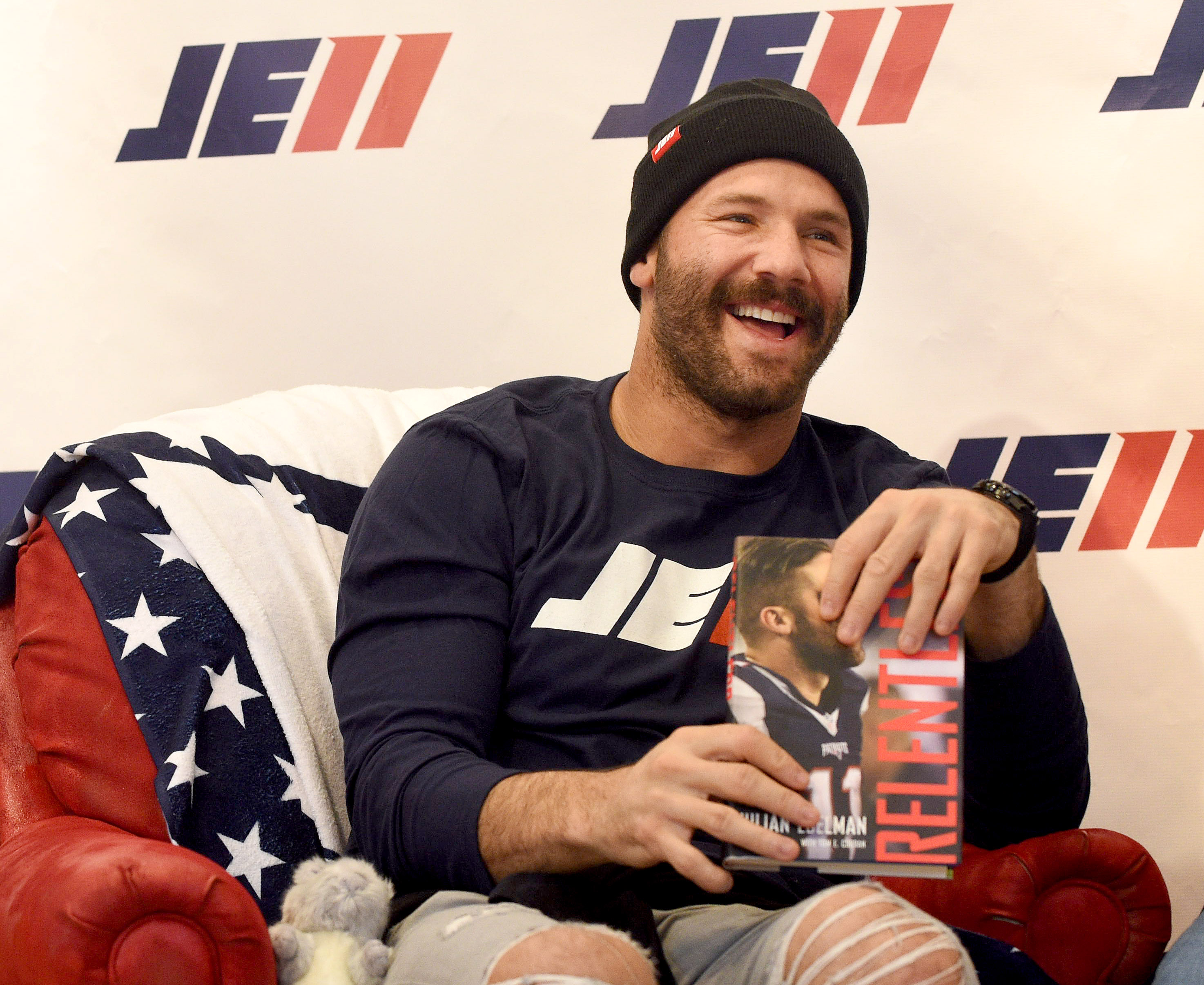 Injured New England Patriots wide receiver Julian Edelman smiles during an event for his new book at JE11 on Newbury Street in Boston, 500 pre-signed books were given out to the 500 who came for their book, Sunday, November 5, 2017, in Boston. Herald Photo by Jim Michaud