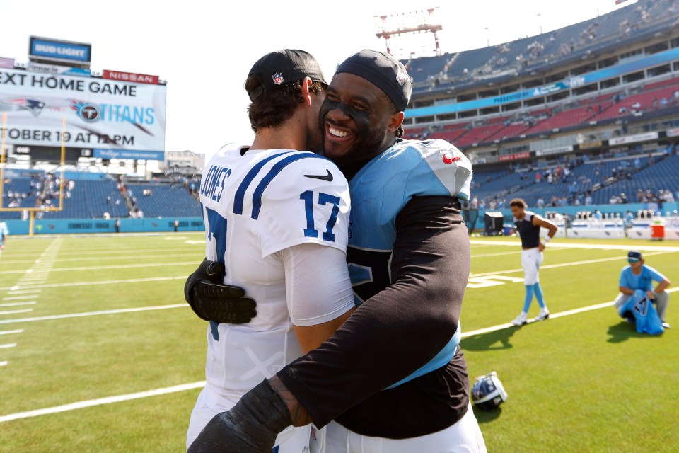 Daniel Jones and Jihad Ward hugging after the game.