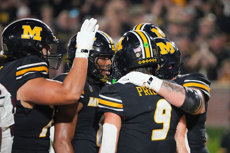 Sep 20, 2025; Columbia, Missouri, USA; Missouri Tigers quarterback Beau Pribula (9) celebrates after running in for a two point conversion against the South Carolina Gamecocks during the second half of the game at Faurot Field at Memorial Stadium.