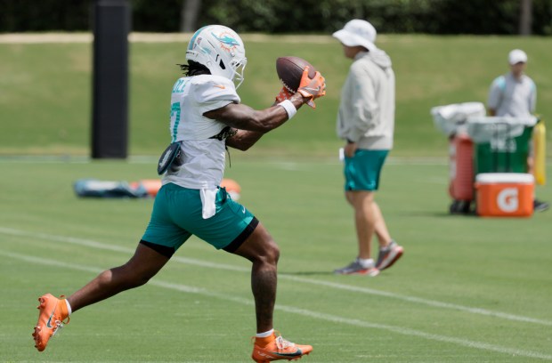 Miami Dolphins Jaylen Waddle catches a ball during practice on...
