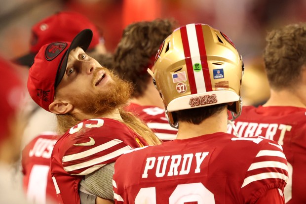 San Francisco 49ers' George Kittle (85) and San Francisco 49ers starting quarterback Brock Purdy (13) converse from the sideline after Purdy's interception by Los Angeles Rams' Darious Williams (24) in the fourth quarter of an NFL game at Levi's Stadium in Santa Clara, Calif., on Thursday, Dec. 12, 2024. (Ray Chavez/Bay Area News Group)