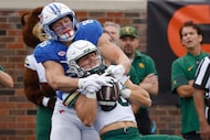 Baylor safety Jacob Redding (38) intercepts a pass intended for SMU tight end Matthew Hibner...