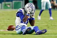 Dallas Cowboys wide receiver CeeDee Lamb (88) reacts after dropping a catch on fourth down...