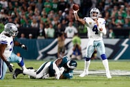 Dallas Cowboys quarterback Dak Prescott (4) throws a pass over the middle during the first...