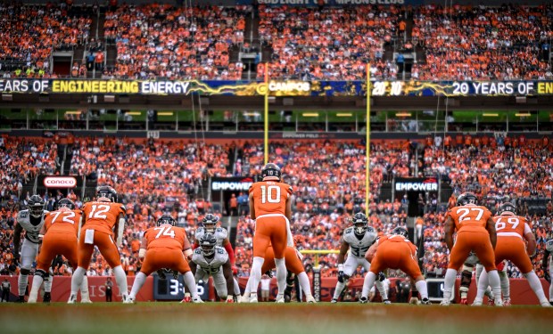 Bo Nix (10) of the Denver Broncos operates during the fourth quarter of the Broncos' 20-12 win over the Tennessee Titans at Empower Field at Mile High on Sunday, Sept. 7, 2025. (Photo by AAron Ontiveroz/The Denver Post)