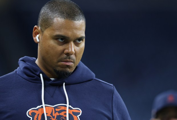 Bears general manager Ryan Poles walks the perimeter of the...
