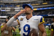Los Angeles Rams quarterback Matthew Stafford (9) walks back to the locker room after an NFL...