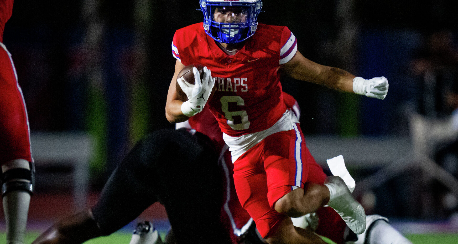Quarterback Rees Wise (9) leads his team in a prayer as the Westlake Chaparrals take the field ahead of their against the Steele Knights at Chaparral Stadium in West Lake Hills, Sept. 19, 2025.