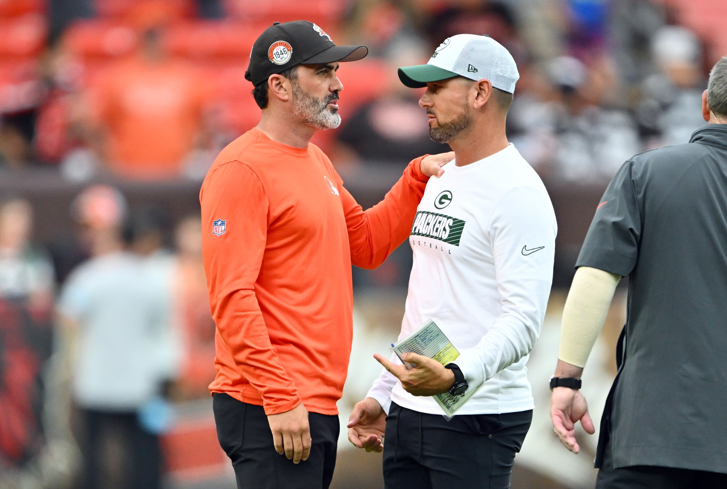 CLEVELAND, OHIO - AUGUST 10: Head coaches Kevin Stefanski of the Cleveland Browns and Matt LaFleur of the Green Bay Packers talk after a preseason game at Cleveland Browns Stadium on August 10, 2024 in Cleveland, Ohio. The Packers defeated the Browns 23-10. (Photo by Jason Miller/Getty Images)