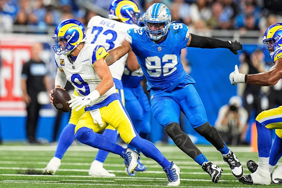 Detroit Lions defensive end Marcus Davenport (92) pressures Los Angeles Rams quarterback Matthew Stafford (9) during the first half at Ford Field in Detroit on Sunday, September 8, 2024.