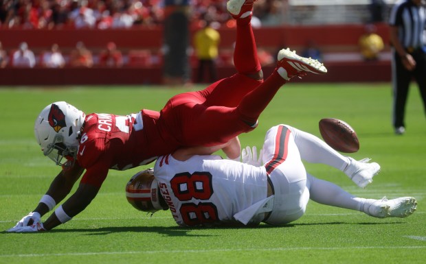 San Francisco 49ers' Jake Tonges (88) can't make a catch against Arizona Cardinals' Kitan Crawford (36) in the second quarter at Levi's Stadium in Santa Clara, Calif., on Sunday, Sept. 21, 2025. (Nhat V. Meyer/Bay Area News Group)