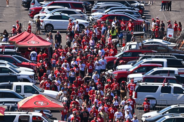 Football fans make their way to the stadium as they arrive for their NFL game at Levi's Stadium in Santa Clara, Calif., on Sunday, Sept. 21, 2025. (Jose Carlos Fajardo/Bay Area News Group)