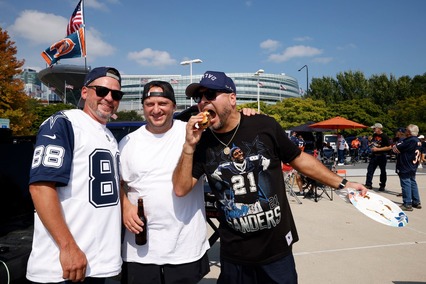 Dallas Cowboys fans Brad Young, from left, Nate Quezada and German Quezada, everybody from...