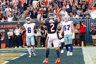 Chicago Bears wide receiver DJ Moore (2) celebrates after scoring a touchdown as Dallas...