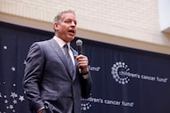 Troy Aikman, former Dallas Cowboys quarterback, speaks at the Children's Cancer Fund model...