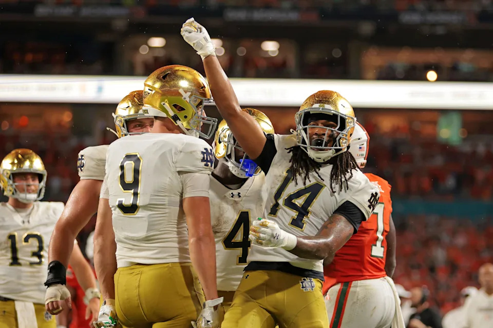 Aug 31, 2025; Miami Gardens, Florida, USA; Notre Dame Fighting Irish wide receiver Micah Gilbert (14) reacts after scoring a touchdown against the Miami Hurricanes during the second quarter at Hard Rock Stadium. Mandatory Credit: Sam Navarro-Imagn Images