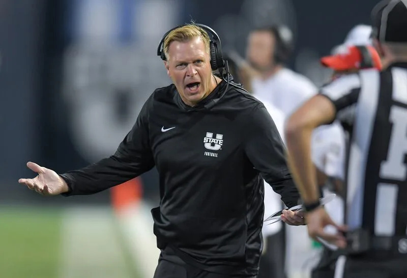 Utah State head coach Bronco Mendenhall argues a call during the first half against Air Force on Saturday Sept. 13, 2025, in Logan, Utah. | Eli Lucero/Herald Journal