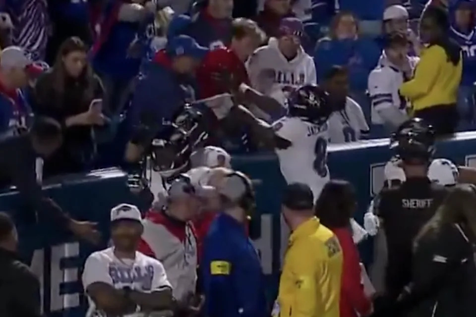 The fan hit DeAndre Hopkins and Lamar Jackson as they celebrated a touchdown. @big_business_/X