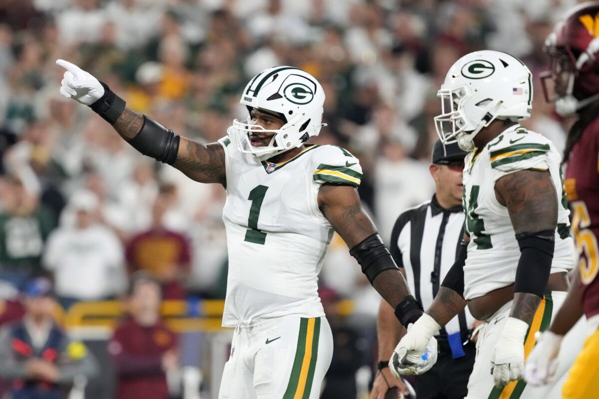 Green Bay Packers defensive end Micah Parsons (1) reacts in the first quarter against the Washington Commanders at Lambeau Field.
