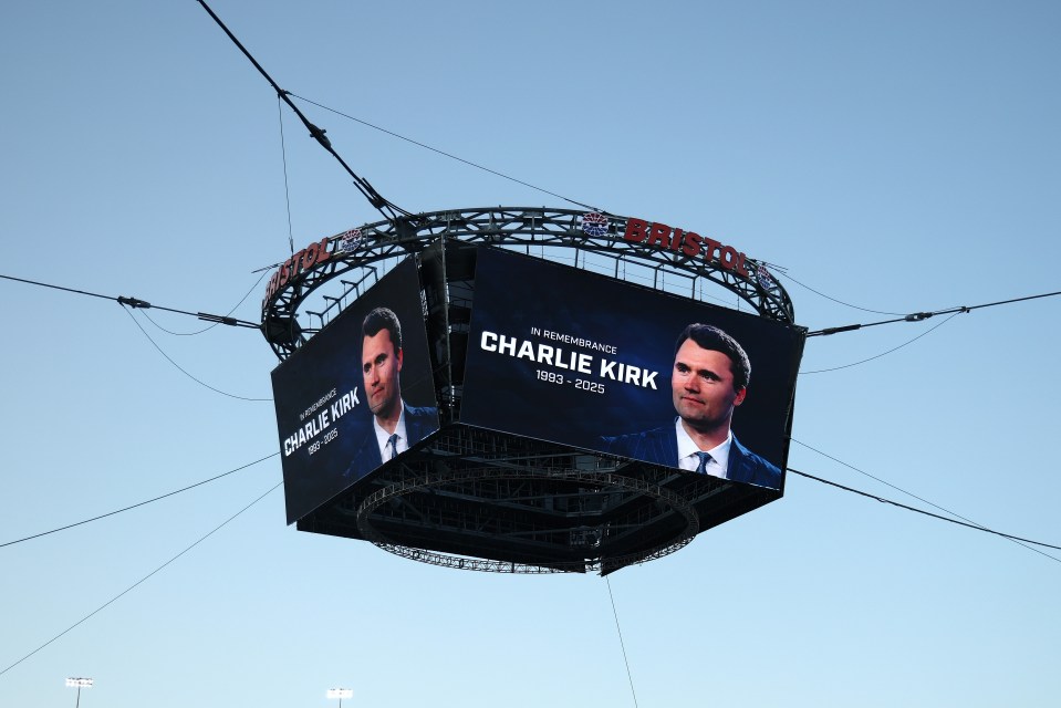 Tribute to Charlie Kirk (1993-2025) on a stadium scoreboard.