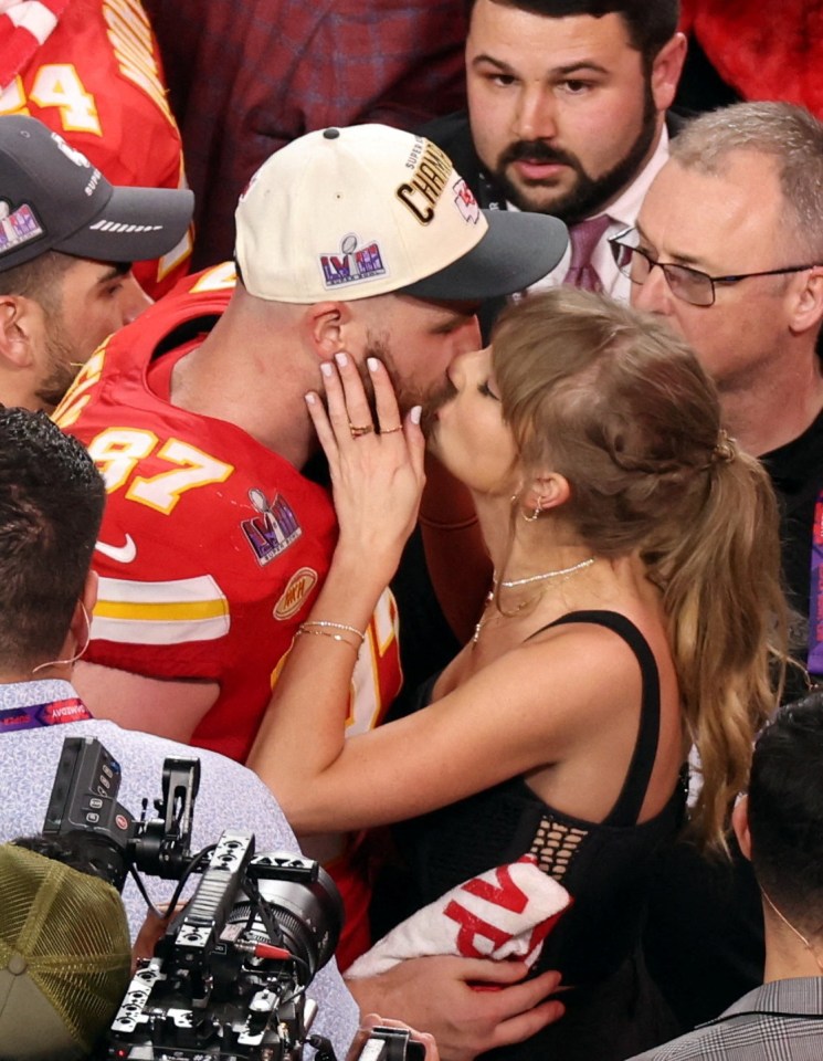 Kansas City Chiefs' Travis Kelce kisses Taylor Swift after Super Bowl LVIII win.