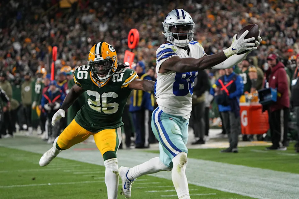 Dallas Cowboys wide receiver CeeDee Lamb beats Green Bay Packers safety Darnell Savage for a touchdown during a game in 2022.