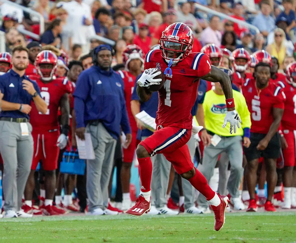 Florida Atlantic wide receiver LaJohntay Wester (1) looks for running room during a 42-20 victory over Monmouth at FAU Stadium on Saturday, September 2, 2023, in Boca Raton, FL.