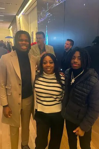Ferrante Edmonds/Instagram Travis Hunter with his mom Ferrante Edmonds and brother Trayvis
