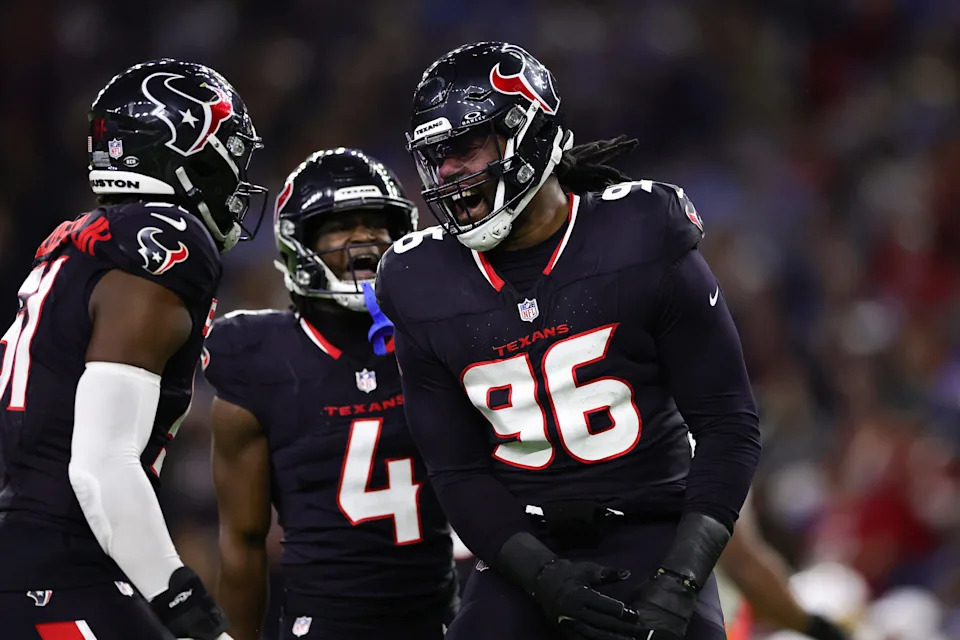 Houston Texans' Denico Autry (96) celebrates after a sack against the Los Angeles Chargers in the third quarter during the AFC wild-card game at NRG Stadium on Jan. 11, 2025 in Houston.
